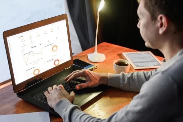 User viewing affiliate earnings dashboard on laptop
